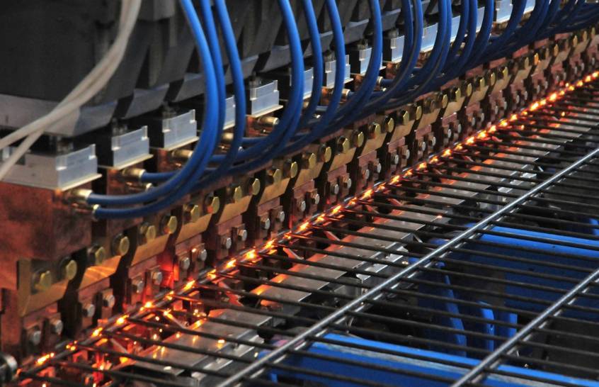 A machine is producing 358 high security fence.