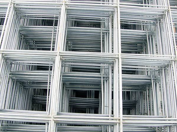 Several pieces of galvanized welded wire mesh panel.